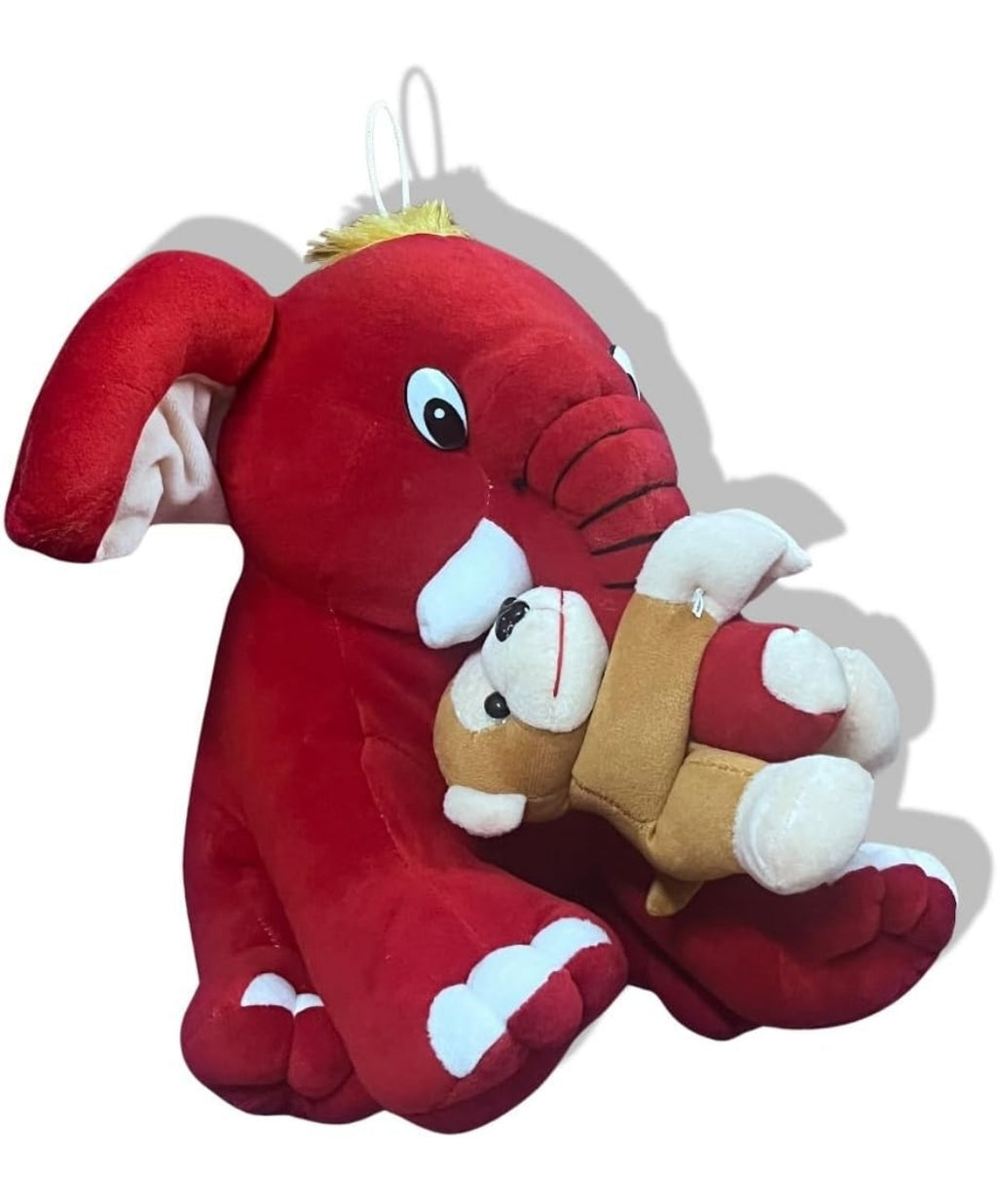 Elephant with monkey soft toy