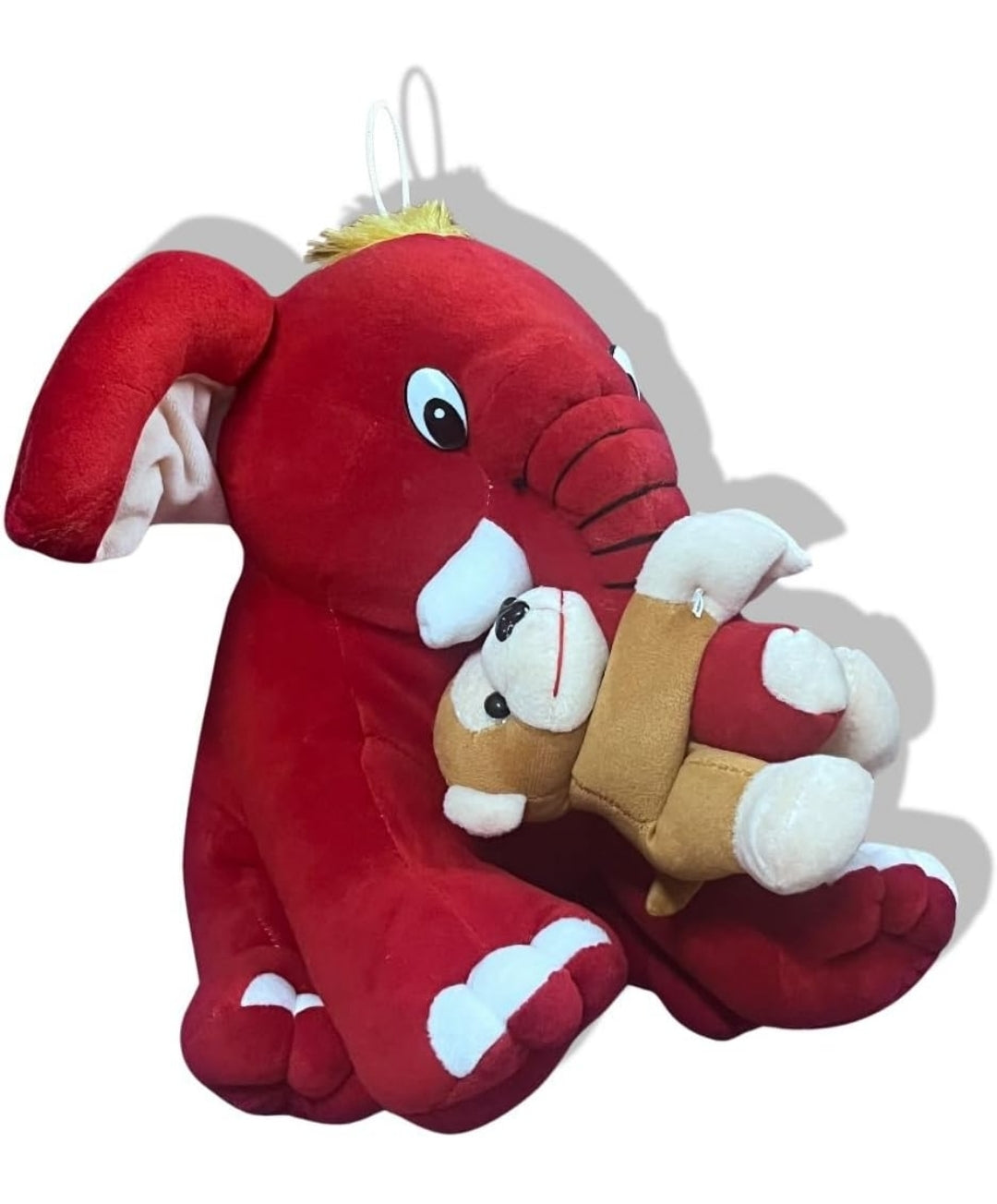 Elephant with monkey soft toy